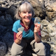 Sharon Baring holding rocks.